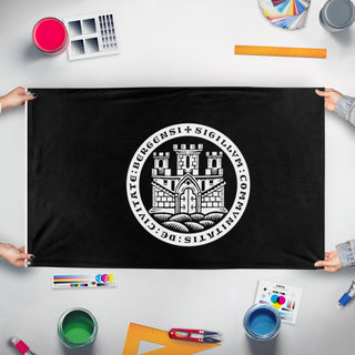 A mockup of the custom flag 'Bergen  flag' held up on a table during print checking