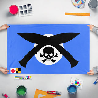 A mockup of the custom flag 'pirate flag' held up on a table during print checking
