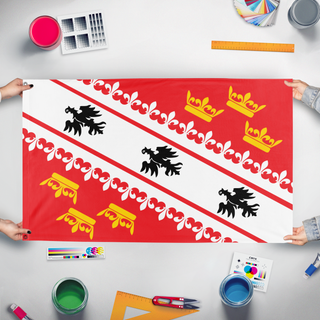 A mockup of the custom flag 'Elsass-Mosel flag' held up on a table during print checking