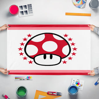 A mockup of the custom flag 'muhsrom kingdoom flag' held up on a table during print checking