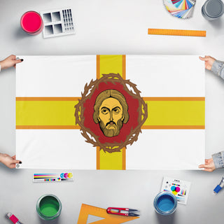 A mockup of the custom flag 'TVF flag' held up on a table during print checking