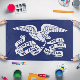 A mockup of the custom flag 'Ohio State of the Union flag' held up on a table during print checking