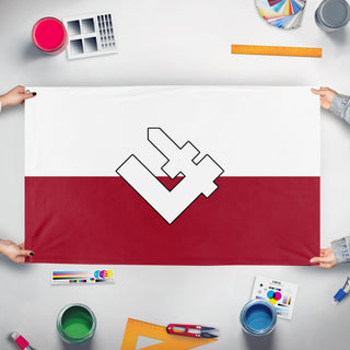 A mockup of the custom flag 'Grupa Falanga flag' held up on a table during print checking