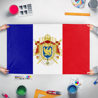 A mockup of the custom flag 'French Empire flag' held up on a table during print checking