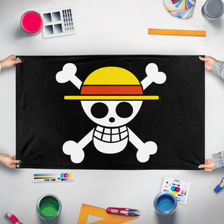 A mockup of the custom flag 'One Piece Protest flag' held up on a table during print checking