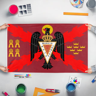 A mockup of the custom flag 'vf flag' held up on a table during print checking