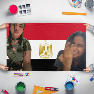 A mockup of the custom flag 'Flag of Heather' held up on a table during print checking