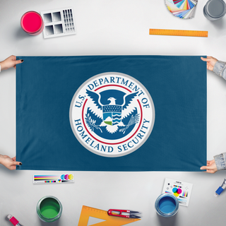 A mockup of the custom flag 'ICE flag' held up on a table during print checking