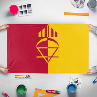 A mockup of the custom flag 'Thing flag' held up on a table during print checking