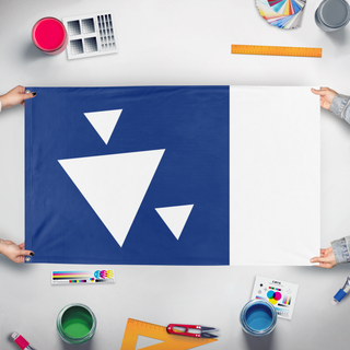 A mockup of the custom flag 'Example Square flag' held up on a table during print checking