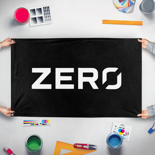 A mockup of the custom flag 'ZERO flag' held up on a table during print checking