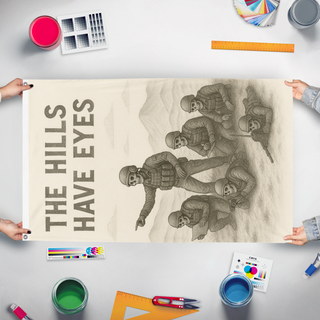 A mockup of the custom flag 'The hills have eyes flag' held up on a table during print checking