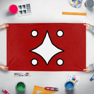 A mockup of the custom flag 'central authority flag' held up on a table during print checking