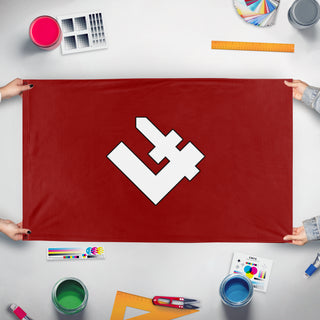 A mockup of the custom flag 'PPNL flag' held up on a table during print checking