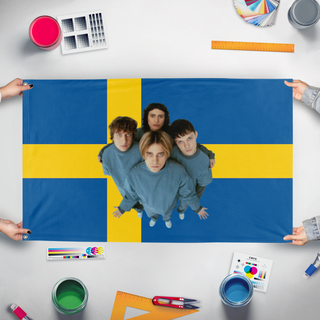 A mockup of the custom flag 'Katarsis - Sweden flag' held up on a table during print checking