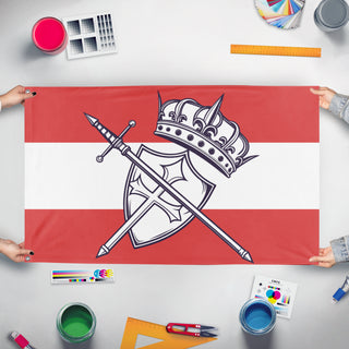 A mockup of the custom flag 'T flag' held up on a table during print checking
