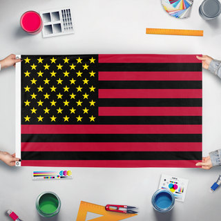 A mockup of the custom flag 'The United Enneaic Saints Flag Of The United States Of America' held up on a table during print checking