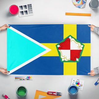 A mockup of the custom flag 'Pembroke massachusetts flag' held up on a table during print checking