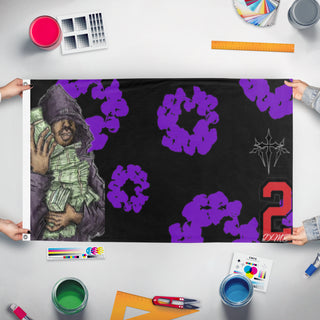 A mockup of the custom flag 'DP flag' held up on a table during print checking