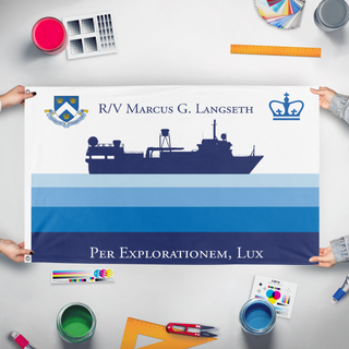 A mockup of the custom flag 'Final MGL Flag' held up on a table during print checking