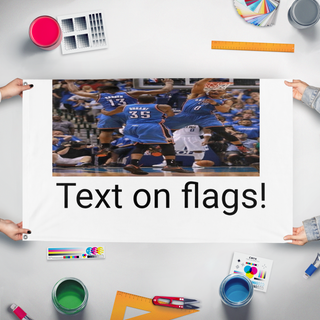 A mockup of the custom flag 'cacca flag' held up on a table during print checking
