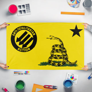 A mockup of the custom flag 'A.T.A ensign flag' held up on a table during print checking