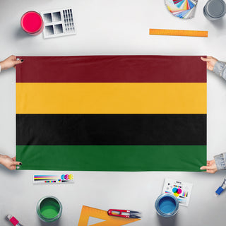 A mockup of the custom flag 'Greater Cosontia Federation flag' held up on a table during print checking