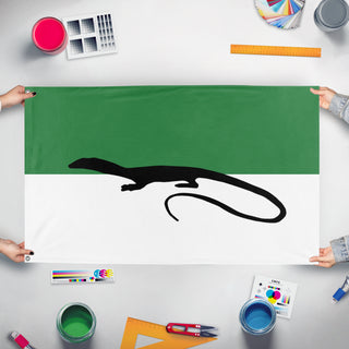 A mockup of the custom flag 'rexuranian flag' held up on a table during print checking