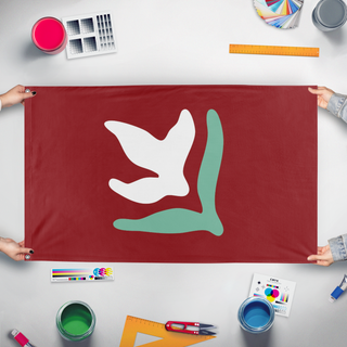 A mockup of the custom flag 'Movement for Social Democracy flag' held up on a table during print checking