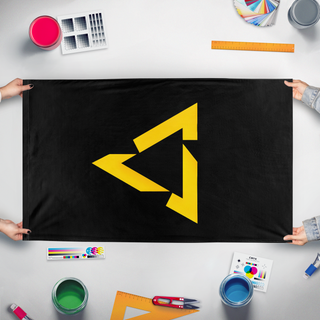 A mockup of the custom flag 'PSQ flag' held up on a table during print checking