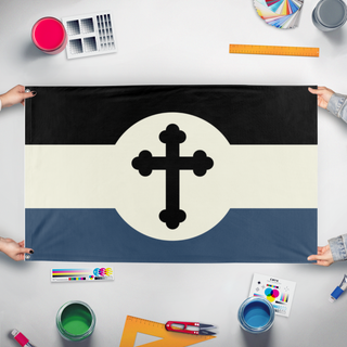 A mockup of the custom flag 'Laurelian Black n Blue flag' held up on a table during print checking
