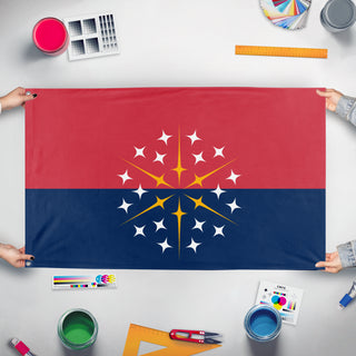 A mockup of the custom flag 'T flag' held up on a table during print checking