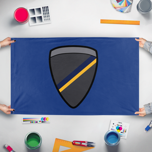 A mockup of the custom flag 'C16 Security Group flag' held up on a table during print checking