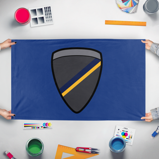 A mockup of the custom flag 'C16 Security Group flag' held up on a table during print checking