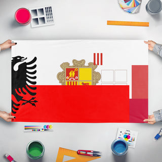 A mockup of the custom flag 'T flag' held up on a table during print checking