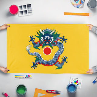 A mockup of the custom flag 'Qing Empire Roundel flag' held up on a table during print checking