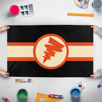A mockup of the custom flag 'Flag of Tetoslavia' held up on a table during print checking