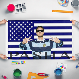 A mockup of the custom flag 'Pashanim flag' held up on a table during print checking