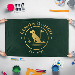 A mockup of the custom flag 'LemonRanch flag' held up on a table during print checking