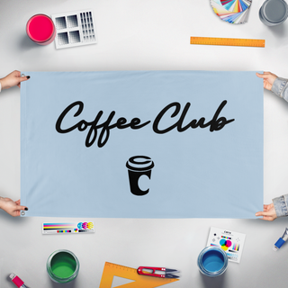A mockup of the custom flag 'Coffee Club  flag' held up on a table during print checking