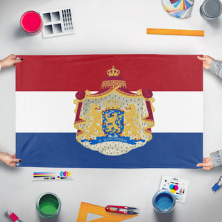 A mockup of the custom flag 'Dutch coat of arms flag' held up on a table during print checking