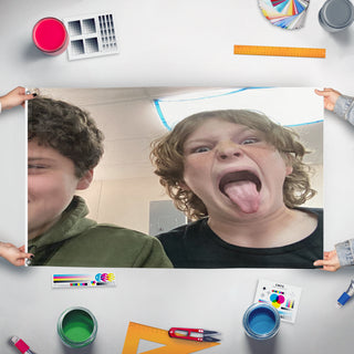 A mockup of the custom flag 'lalalas flag' held up on a table during print checking