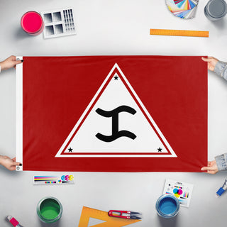 A mockup of the custom flag 'Rizal Identitarian flag' held up on a table during print checking