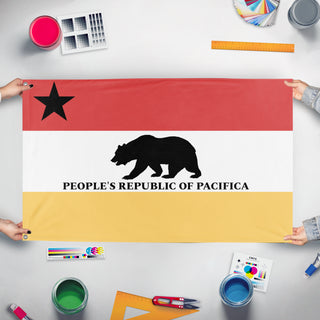 A mockup of the custom flag 'Trussean Province of Pacifica flag' held up on a table during print checking