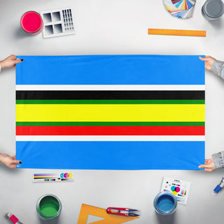 A mockup of the custom flag 'East African flag' held up on a table during print checking