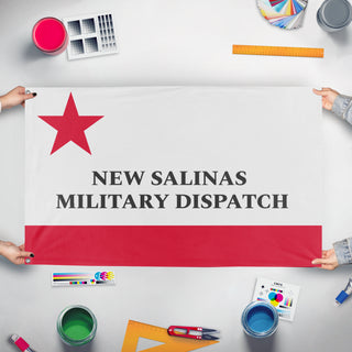 A mockup of the custom flag 'New Salinas flag' held up on a table during print checking