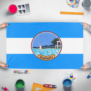 A mockup of the custom flag 'Flag' held up on a table during print checking