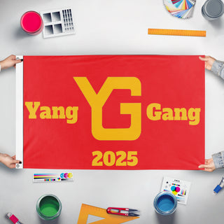 A mockup of the custom flag 'Yang Gang flag' held up on a table during print checking