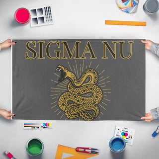 A mockup of the custom flag 'sigma nu flag' held up on a table during print checking