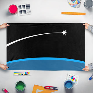 A mockup of the custom flag 'Danaverine Interstellar Program flag' held up on a table during print checking